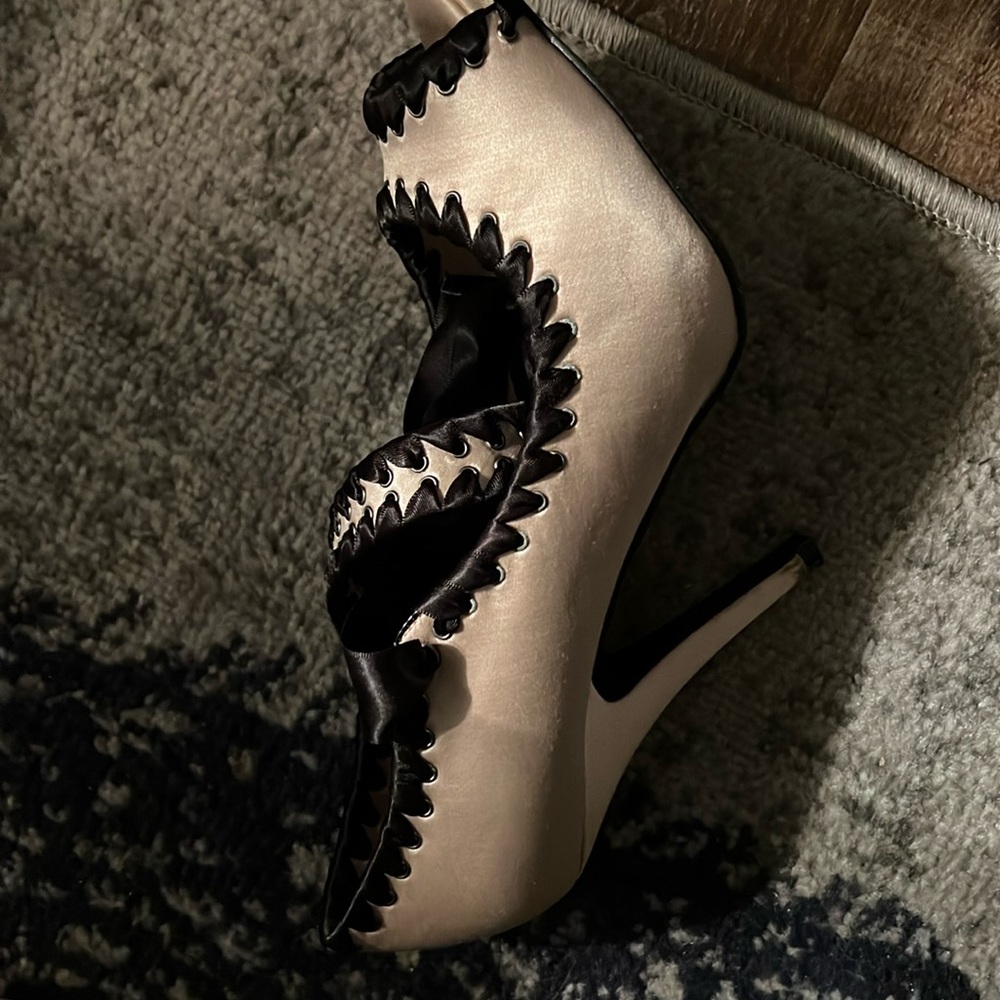 Bakers Pink and Black Peep Toe Heels 
Perfect for prom